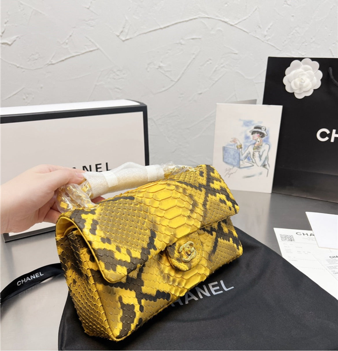 Woman Chanel shoulder handbag